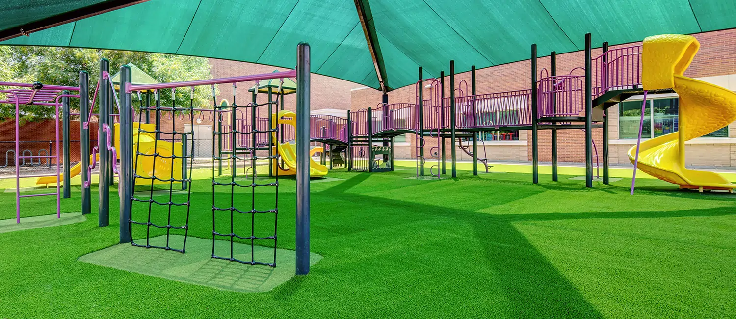 playground on artificial grass lawn